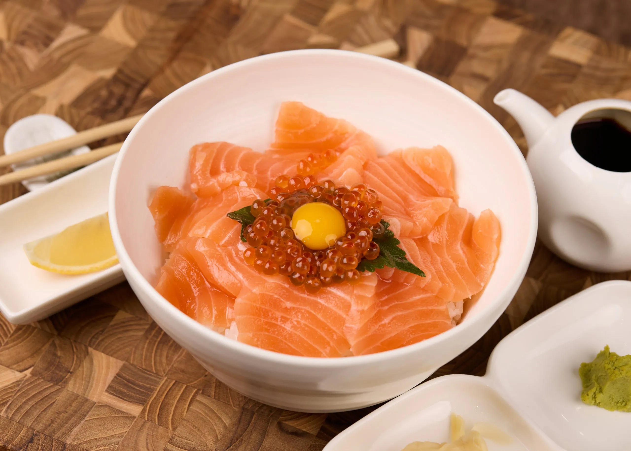 Salmon rice bowl with ikura and egg at Dozo Sushi & Bar, a Japanese Restaurant in Monrovia